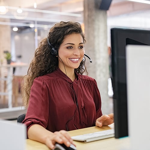 Woman providing customer service for labels 