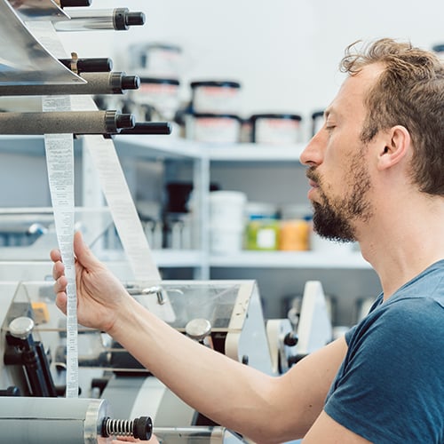 Man in control lab testing labels 