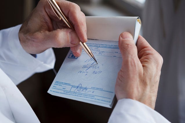 Person filling out watermarked document